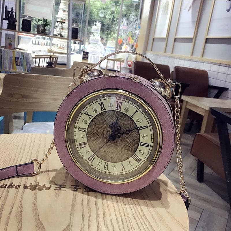 Sac Horloge Steampunk posé sur une table | Steampunk Store