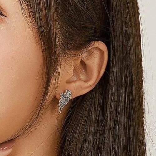 Boucles d Oreilles Ailes d Ange Argent sur une femme