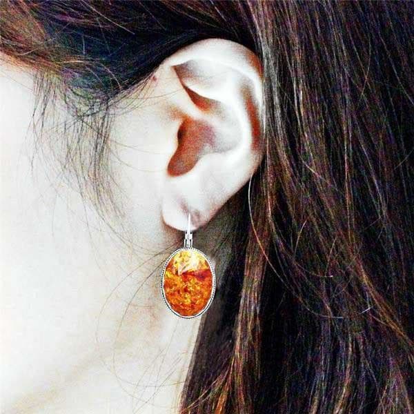 boucle d oreille ambre et argent miel sur modèle- steampunk store