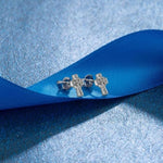 Boucles d Oreilles Croix Argent sur un ruban bleu