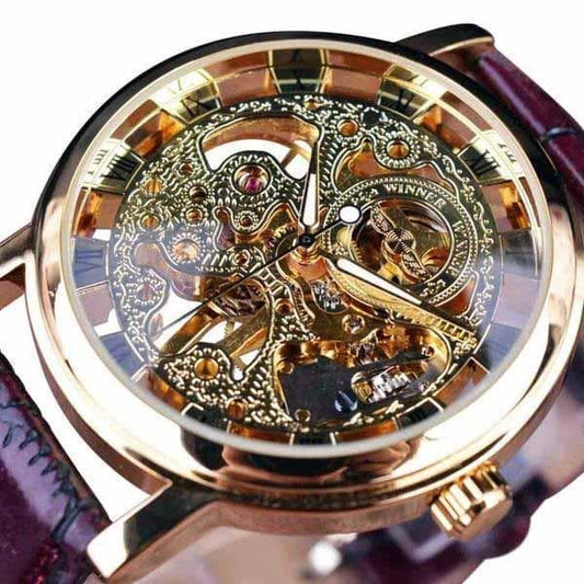 montre automatique squelette or sombre