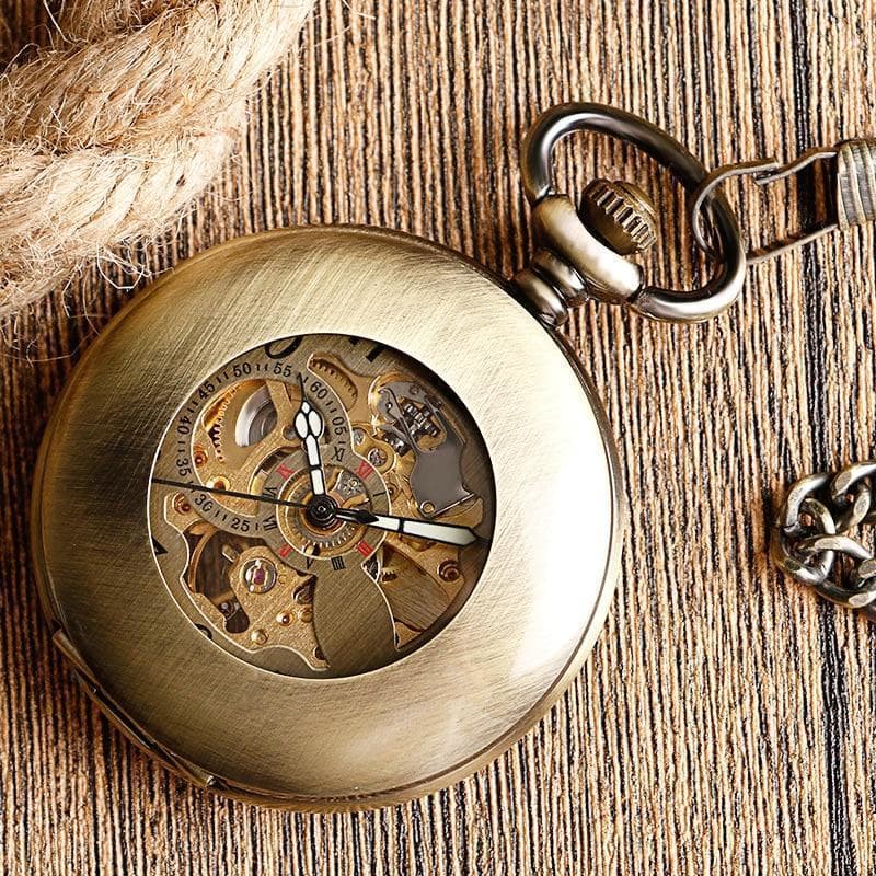 Montre Gousset Cuivre posée fond bois - Steampunk Store